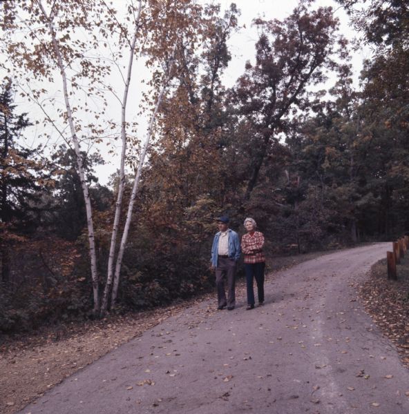 Melvin and Sadie Tvedt of Mount Horeb, walking down a trail at Governor Dodge State Park.