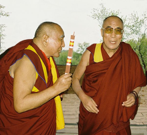 His Holiness, the Dalai Lama, and Geshe L Sopa at the entrance of the Deer Park Buddhist Center Temple.