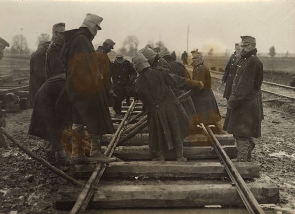 Austrian soldiers repairing railroad tracks in Serbia during World War I. 