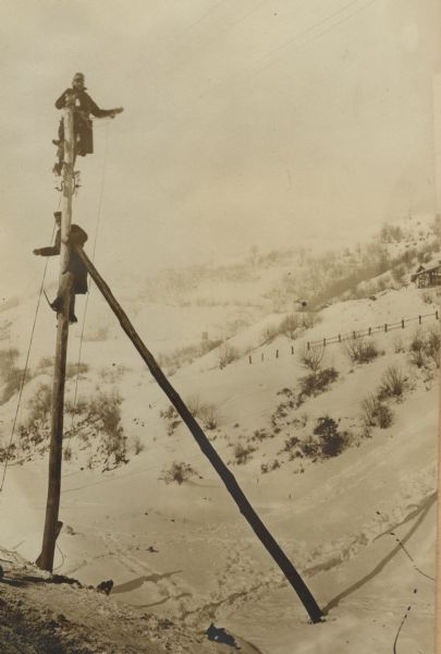 Repairing telephone wires in the Uzsok Pass, Galicia, which had been destroyed by the Russians.