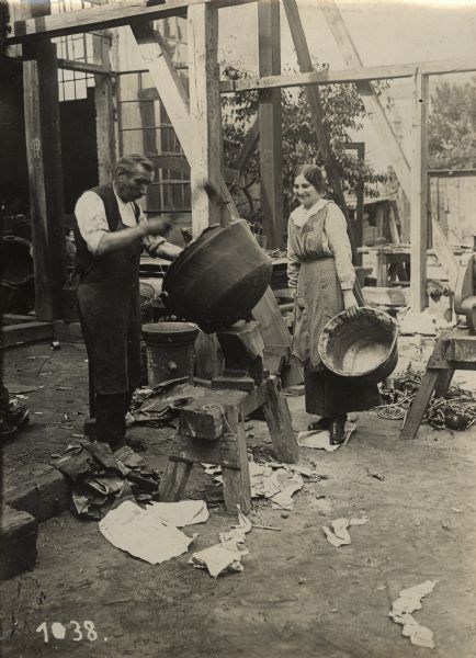 Metal collecting site located in Friedenau (Berlin). Separating pieces of iron. 