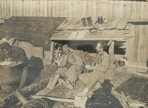 Austrian troops in winter quarters in Serbia. German caption states "A sunny spot."