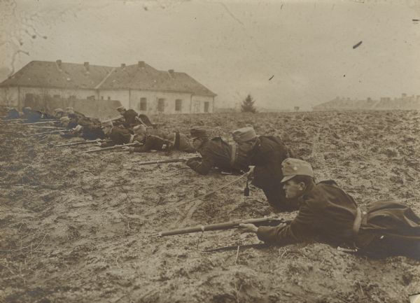 Austrian troops in a trench line on the Nida River in Poland.