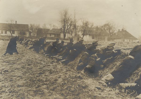 Austrian troops in a trench line on the Nida River in Poland.