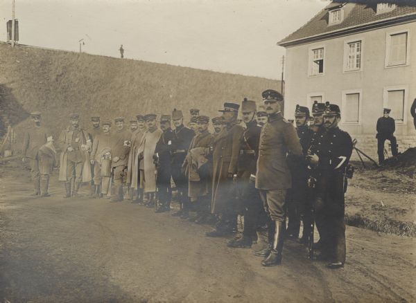 German Red Cross officers and men who had been released from French PoW camps in conformance with Geneva Convention rules. 