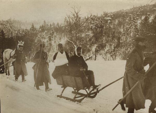 Transporting wounded soldiers in the Carpathians.