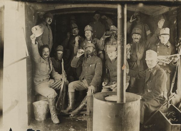 Austrian troops riding in a box car on their way to the front. 