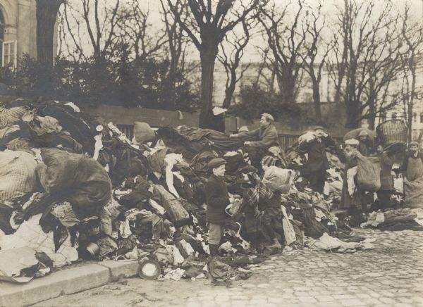 Results of the "Reich's Wool Week." Every day loads of wool garments arrived at the collection point in the old Kroll Opera House and were sorted by volunteers.
