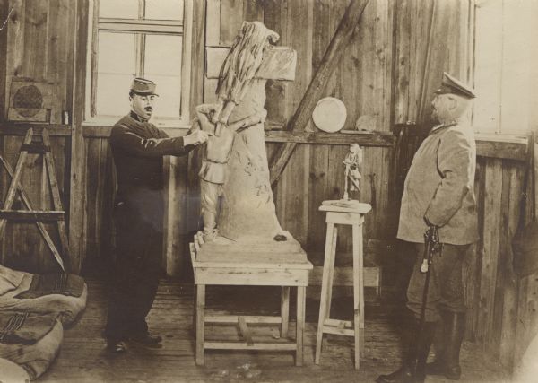 A French prisoner, who is a sculptor, who has been given a private studio space to work on his art. 