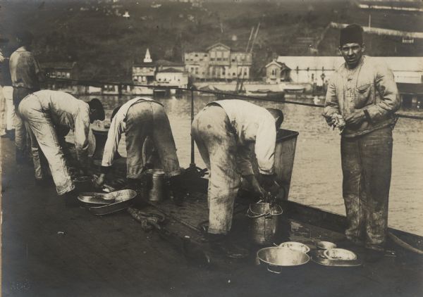 Washing the decks on the battlecruiser <i>Sultan Javus Selim</i>.