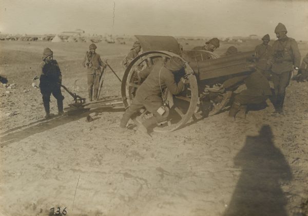 Turkish gun crew practicing the emplacement of artillery into a firing position.