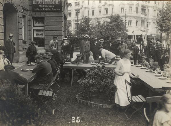 Open air dining for civilians without money in the Friedenau-Wilmersdorf district of Berlin along the the Kaiserplatz.