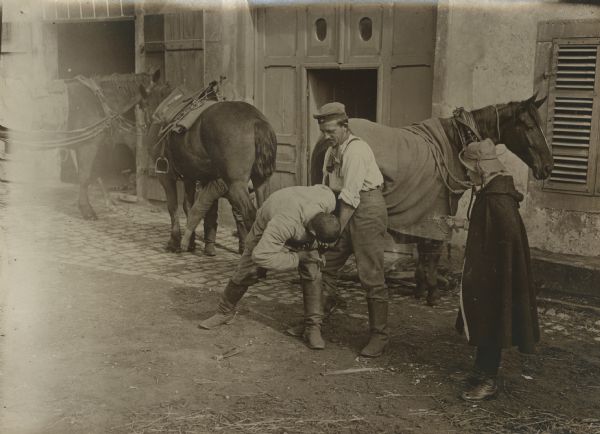 Our Bavarians in the Vosges. A farrier at work on a horse.