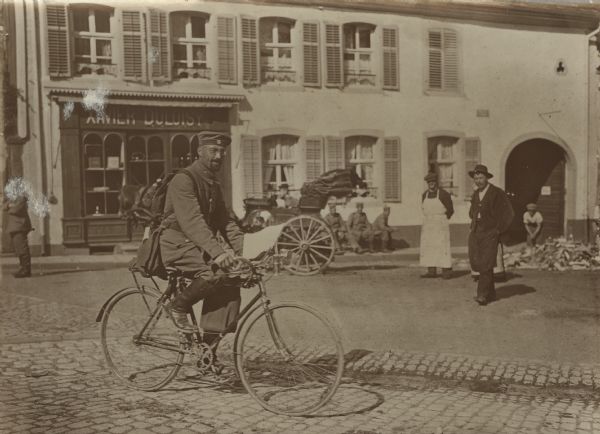 The watch in the Vosges. Soldier (on bicycle) on patrol with a white handkerchief as a recognition sign.
