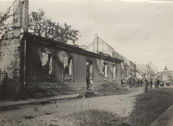 Scene of destroyed and burned out buildings.