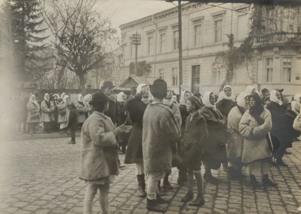 Children mingling in the town square.