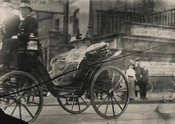 The Empress and Princess Eitel Friedrich riding in a carriage on the way to visit the hospital ship.