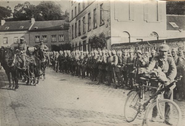 The German 83rd Infantry Regiment in the City of Namur, in Belgium, preparing to move out.