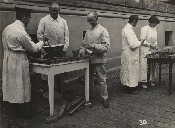 The medical depot in Berlin. Preparation of foot cream.
