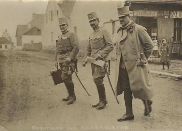General staff officers walking through the headquarters.