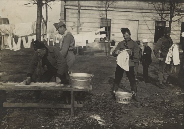 Austrian soldiers washing clothes.
