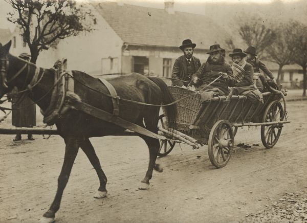 Galician refugees riding in a cart headed for military headquarters.