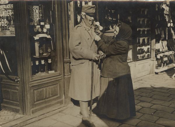 Corsage Pinned to Soldier | Photograph | Wisconsin Historical Society