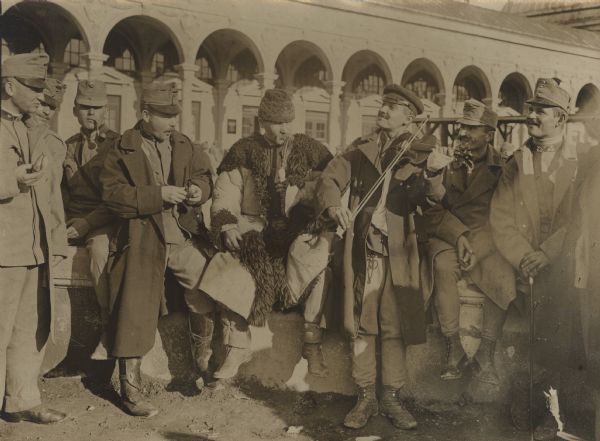 Hungarian recruit in Vienna with an injured hand playing the violin in a Hungarian manner.