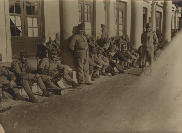 Wounded Austrian soldiers in the Vienna Rotunde on a sunny day.