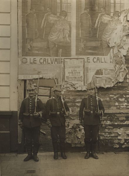 Soldiers posing in front of the cinema building in Antwerp.