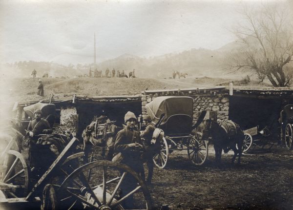 Troops resting in front of an inn in the Taurus Mountains. 