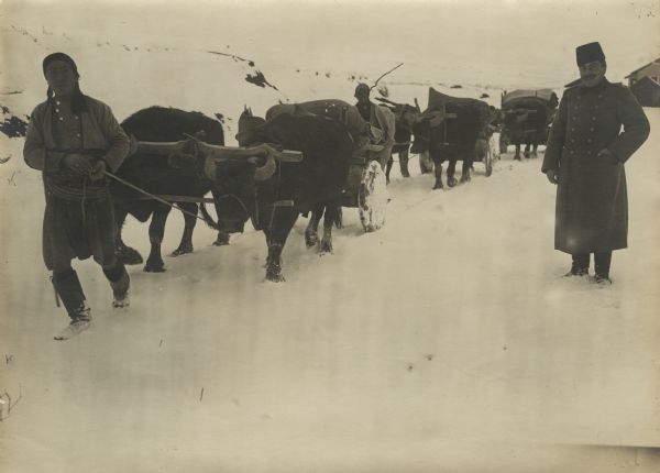 Military transport through the snowy Taurus Mountains. 