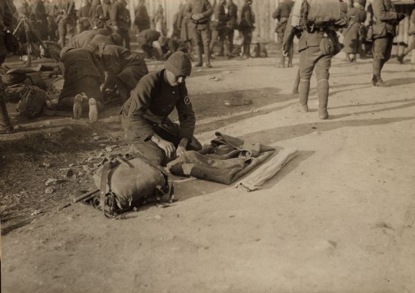 Turkish soldiers breaking camp. 