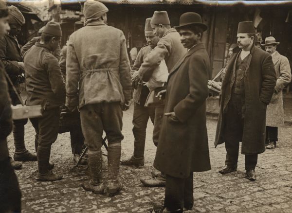 Turkish soldiers and officers buying food in the capital as they prepare to ship out. 