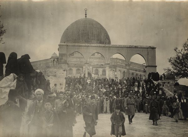 A historic moment. Djemal Pascha leaving the Mosque of Omar (Dome of the Rock) in Jerusalem on his way to the desert. **Frankl mis-identifies the scene as Mosque of Omar, when, in fact, it was the Dome of the Rock that Djemal Pascha is leaving. The event occurred either at the end of December 1914 or early January 1915.**