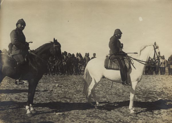 The Holy War.  Djemal Pascha in the desert reviewing troops departing for the Suez Canal. Behind him on the left on horseback, is Colonel von Frankenberg, Chief of Staff of the 4th Army.