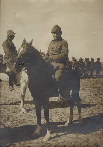 Colonel von Frankenberg sitting on his horse in the desert as he is heading to the front. 