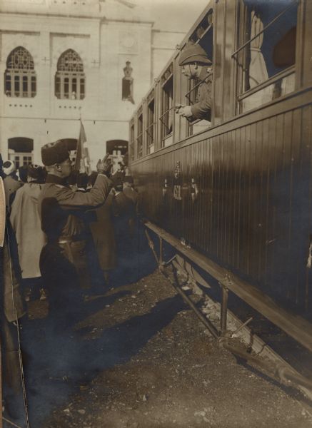 Colonel von Frankenberg, Chief of Staff of the 4th Army, in a rail car being given well wishes by Colonel Trommer. Scene at the Damascus train station. 