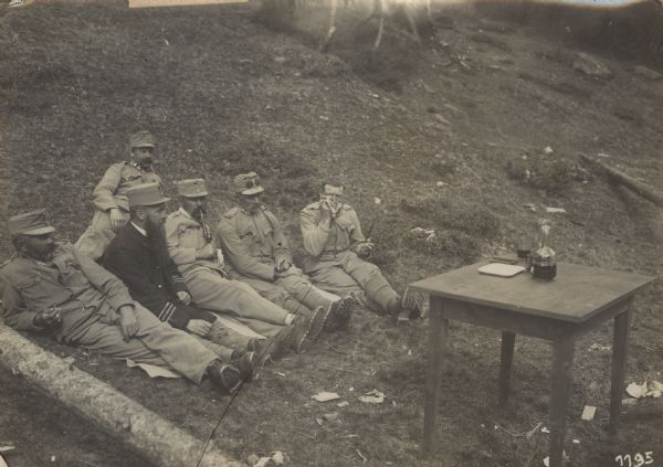 Tiroler Standschützen officers and chaplain at an outdoor picnic. 