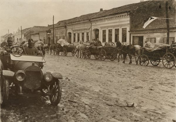 Courier automobile in the foreground. 