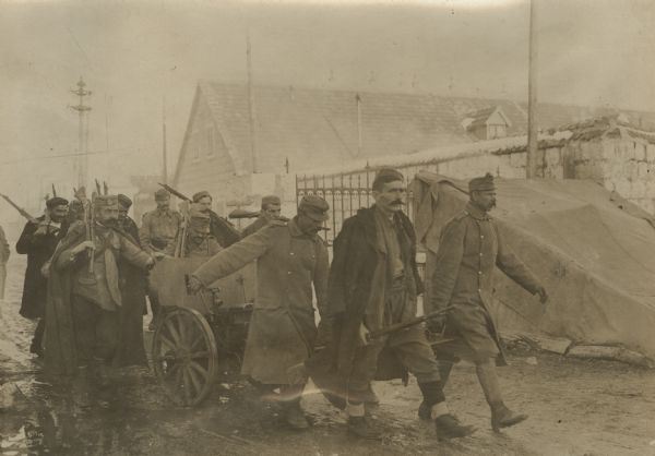 Montenegrin soldiers surrendering their weapons.