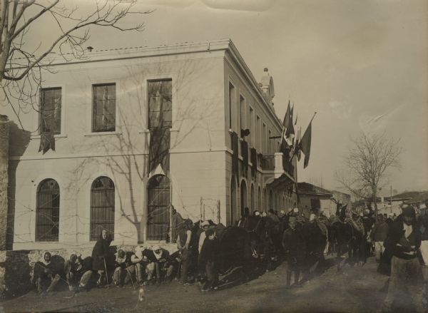 Skutari city hall bedecked with flags on the day of surrender of Montenegran troops. 