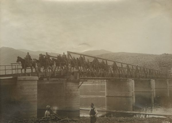 On Lake Skutari (Skodar) in Albania. Austrian cavalry crossing the bridge near Skutari, Albania. 