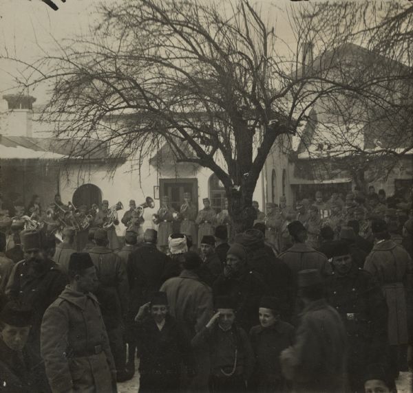 Through Bosnia and the Herzegovina during the war. Celebrating the Mevlud (Mawlid) festival to commemorate Mohammed's birthday on January 18th (1916) in Sarajevo. Bosnian Muslim soldiers and an Austrian military band in front of the mosque.
