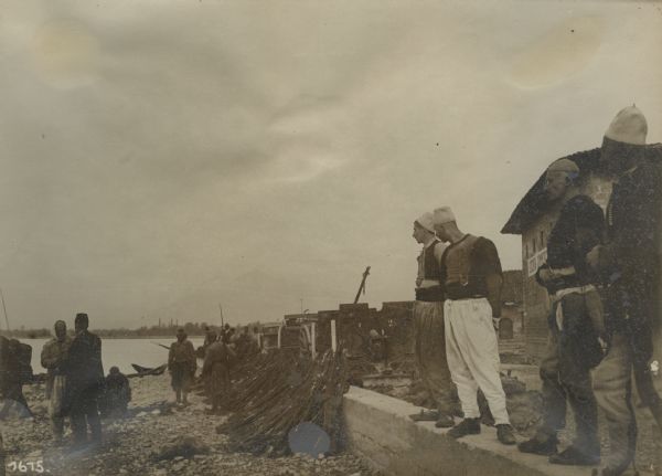 Captured weapons being collected on the shore in preparation for shipment to the rear, Montenegro and Albania. 