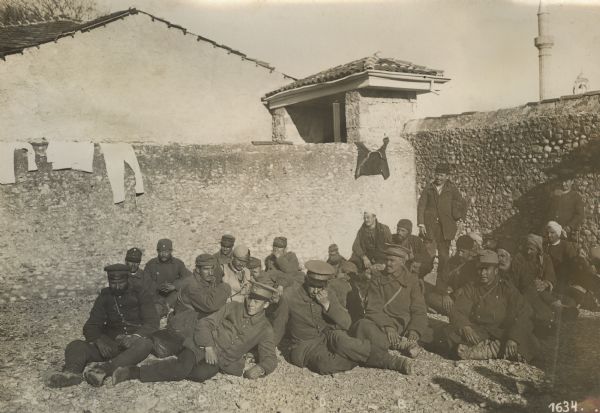 German, Bulgarian and Austrian soldiers, in all manner of clothing, who have assisted each after fleeing from Serbian prisoner camps and have arrived in Skutari, Albania.