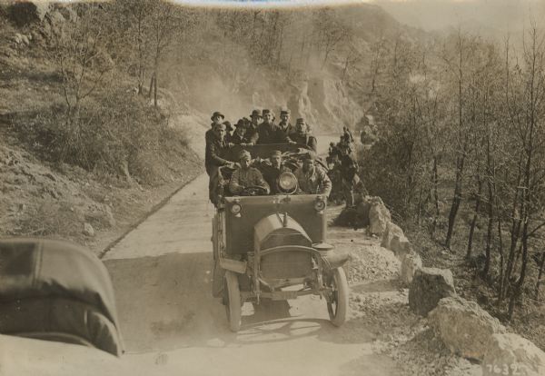 Disarmed Serbian and Montenegran soldiers, as well as civilian refugees, crossing the Black Mountains from Albania on their way home. 