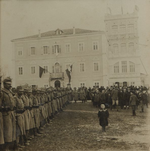 Mass of celebration in Skutari, Albania. The building in the background is the archbishop's palace. Although a majority Muslim country, Albania had a significant Catholic minority whose main center was the City of Skutari. 