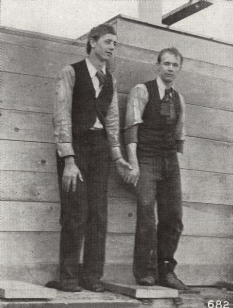 Carl A. Johnson (left) and his younger brother, Hobart (right), as young men working at Gisholt Machine Company “after they boxed the first foreign shipment of machines, which they also helped build and test.” One of these brothers subsequently followed the shipment to Europe to assist in installing and demonstrating in the shop of the customer.” 

After their father died in 1901, Carl took over the company as president and general manager, and Hobart as vice president and factory works manager.