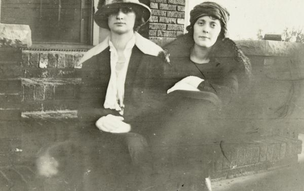 Page caption reads: "Eleanor Nelson, Florence Caldwell, Katherine Magill." It is not clear which two of these women are posing together.
